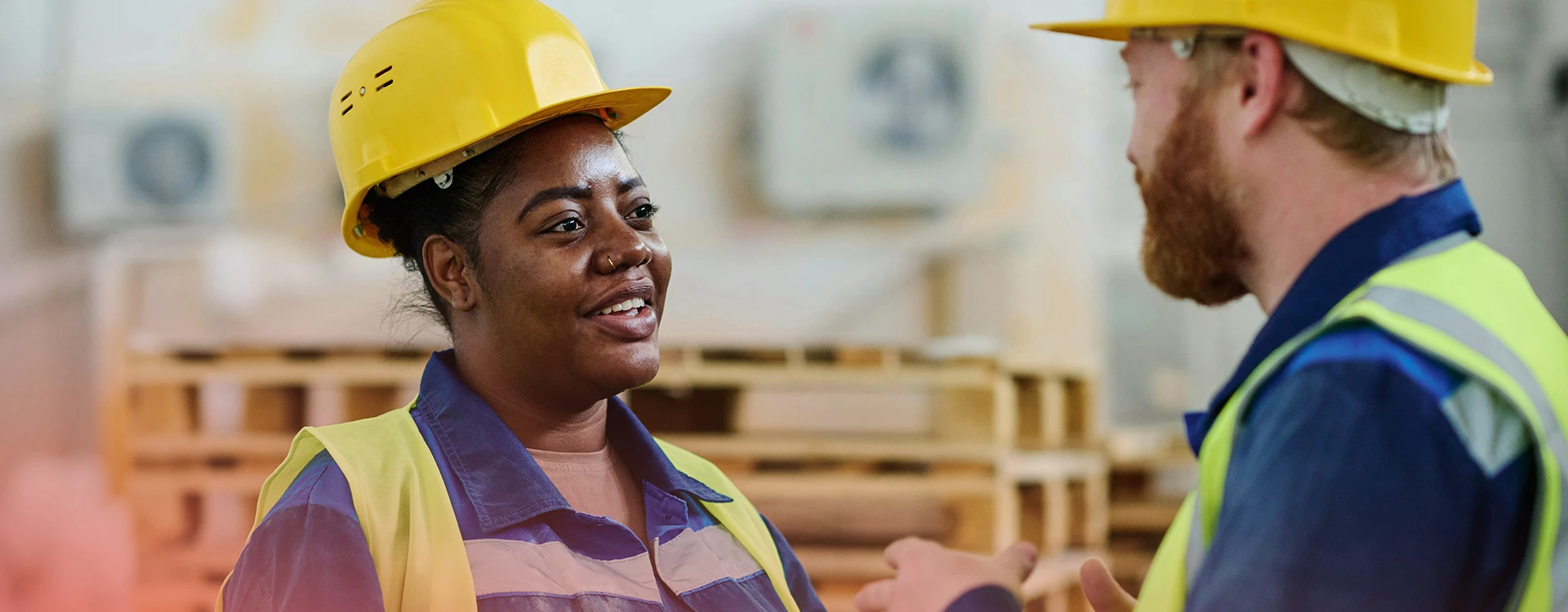 A Young Black Facilities Inspector in Warehouse.