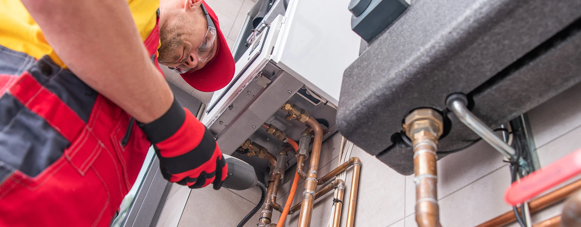 Gas Heating Technician Using Gas Detector.